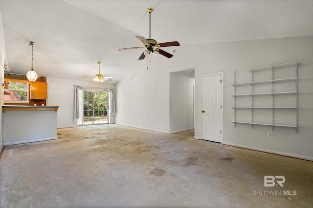 unfurnished living room with ceiling fan, a textured ceiling, unfinished concrete floors, baseboards, and high vaulted ceiling