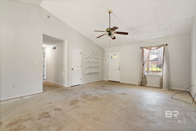 unfurnished living room with ceiling fan, unfinished concrete flooring, baseboards, and high vaulted ceiling