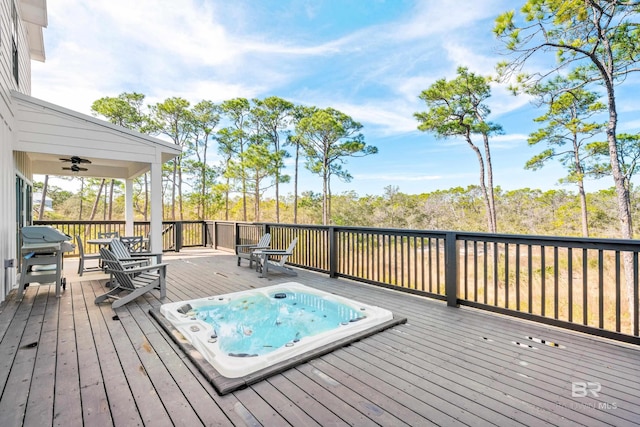 wooden terrace featuring area for grilling