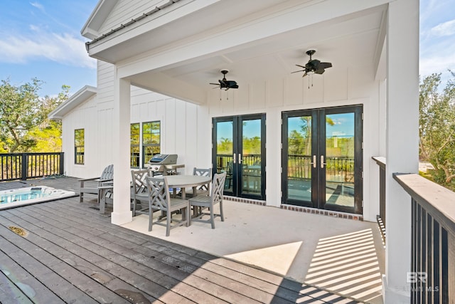 wooden deck with a grill, french doors, and ceiling fan