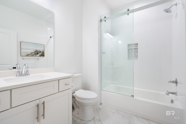 full bathroom featuring tile floors, bath / shower combo with glass door, large vanity, and toilet