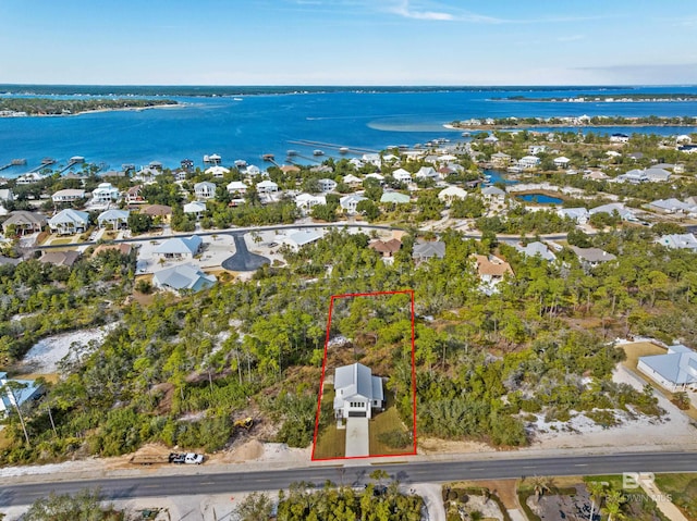 drone / aerial view featuring a water view