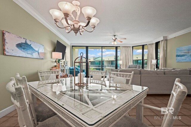 dining space with ceiling fan with notable chandelier, tile patterned flooring, and ornamental molding