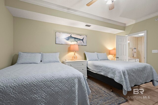 bedroom featuring ornamental molding, tile patterned flooring, and ceiling fan