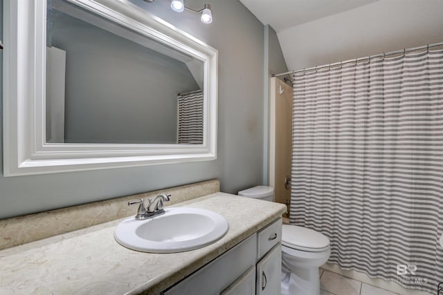 bathroom with tile patterned flooring, toilet, vanity, and curtained shower