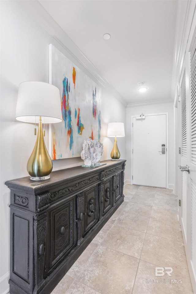 26688 Perdido Beach Blvd Unit 505, Orange Beach, AL 36561 - hall featuring light tile patterned floors, baseboards, and ornamental molding