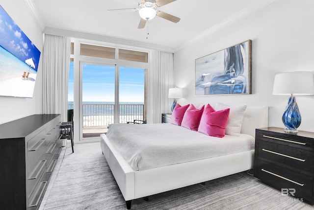 26688 Perdido Beach Blvd Unit 505, Orange Beach, AL 36561 - bedroom with carpet flooring, crown molding, a ceiling fan, access to exterior, and a water view