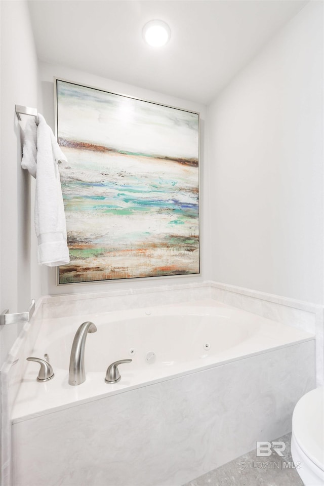 26688 Perdido Beach Blvd Unit 505, Orange Beach, AL 36561 - bathroom featuring toilet and a tub with jets