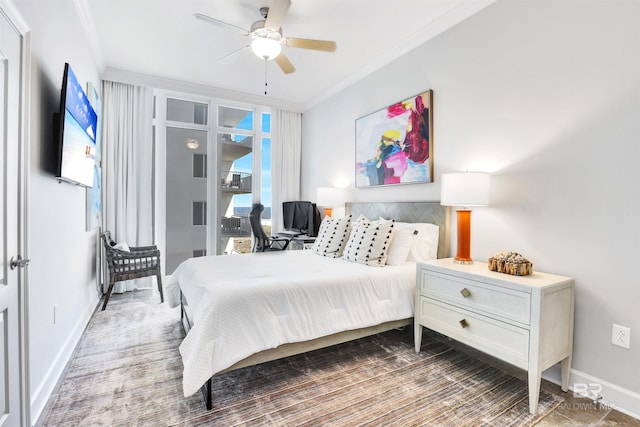 26688 Perdido Beach Blvd Unit 505, Orange Beach, AL 36561 - bedroom with crown molding, ceiling fan, and baseboards