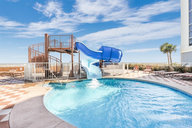 26688 Perdido Beach Blvd Unit 505, Orange Beach, AL 36561 - pool featuring a water slide and a patio