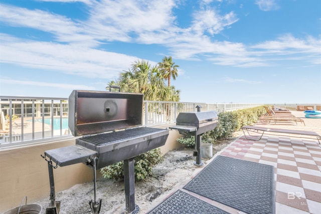 26688 Perdido Beach Blvd Unit 505, Orange Beach, AL 36561 - view of patio / terrace featuring grilling area