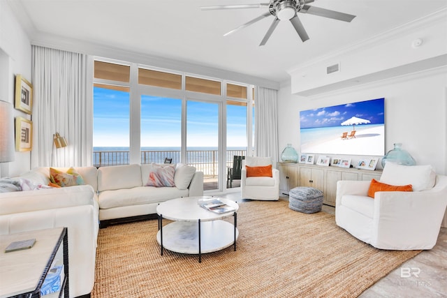 26688 Perdido Beach Blvd Unit 505, Orange Beach, AL 36561 - living area with crown molding, visible vents, a ceiling fan, and a water view