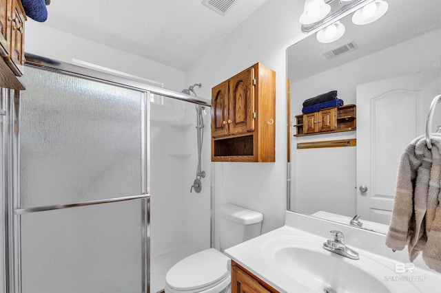 6950 Summerset Dr, Gulf Shores, AL 36542 - full bathroom with a shower stall, vanity, and toilet