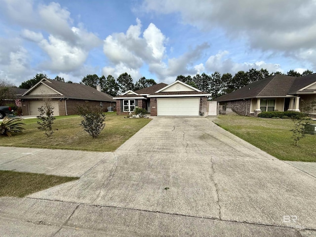 6950 Summerset Dr, Gulf Shores, AL 36542 - ranch-style home with an attached garage, a front yard, concrete driveway, and brick siding
