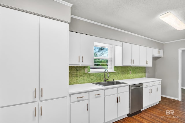 kitchen featuring backsplash, dishwasher, a sink, white cabinetry, and a textured ceiling