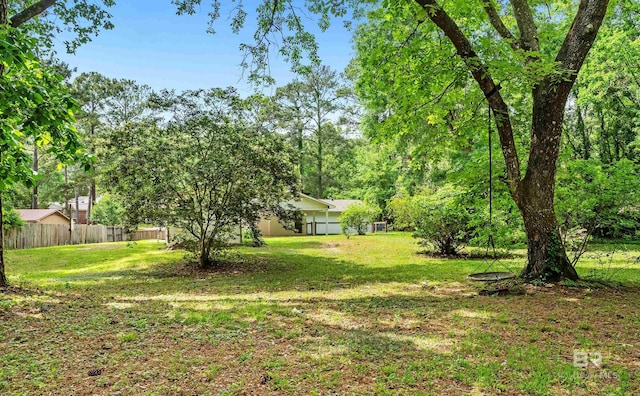 view of yard with fence