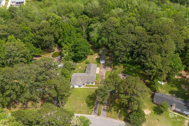 aerial view featuring a view of trees