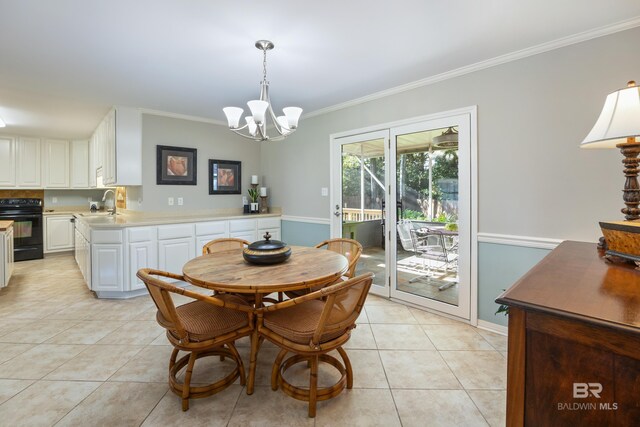 tiled dining space with sink, crown molding, and a notable chandelier