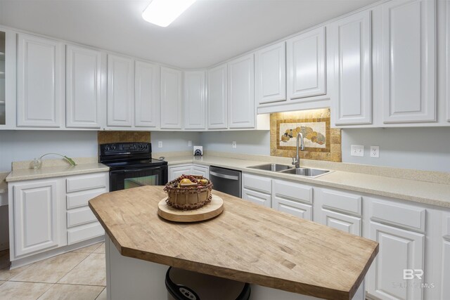 kitchen featuring white cabinets, dishwasher, a kitchen island, sink, and black electric range