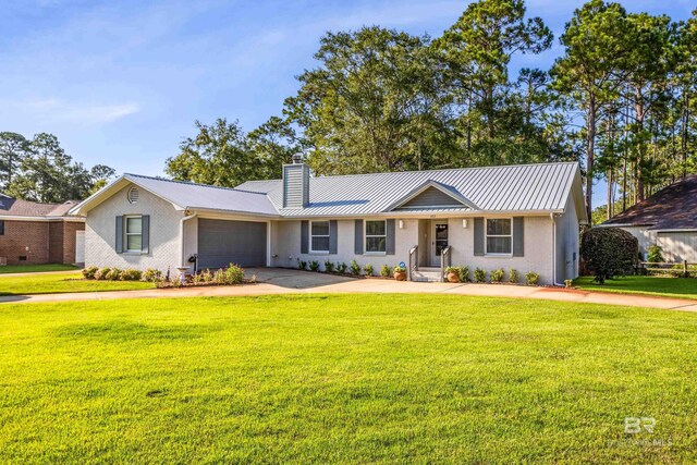 single story home with a garage and a front lawn