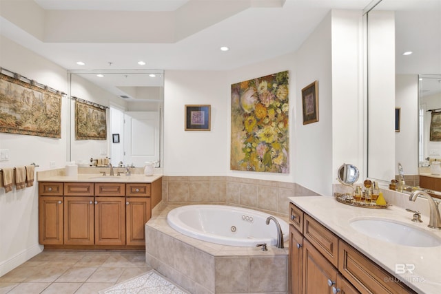 bathroom with tile patterned flooring, a sink, a whirlpool tub, and recessed lighting