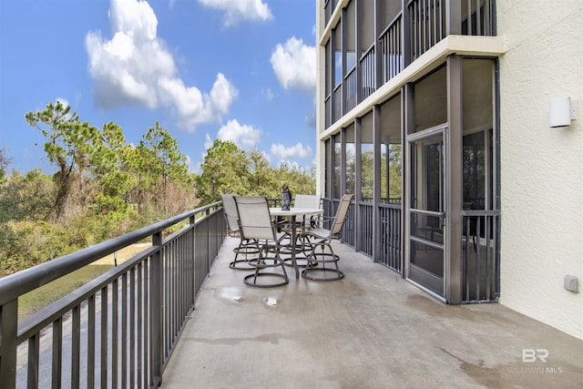 balcony featuring outdoor dining space