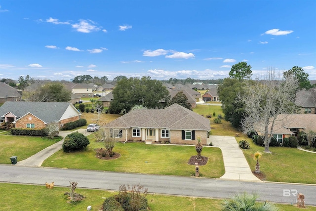 birds eye view of property with a residential view