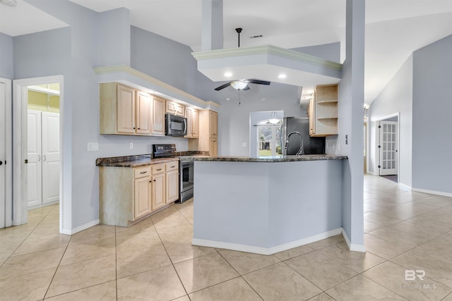 kitchen with black microwave, ceiling fan, light brown cabinets, stainless steel electric range, and freestanding refrigerator