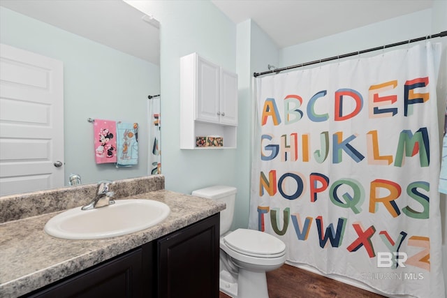 17372 Tallasee Blvd, Foley, AL 36535 - bathroom featuring vanity, wood finished floors, and a shower with curtain