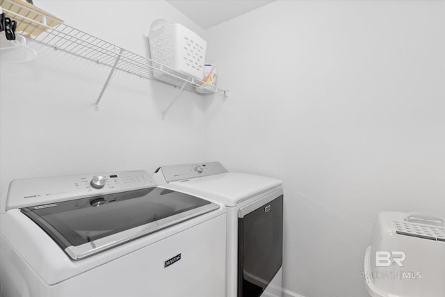 17372 Tallasee Blvd, Foley, AL 36535 - laundry area with washing machine and dryer and baseboards