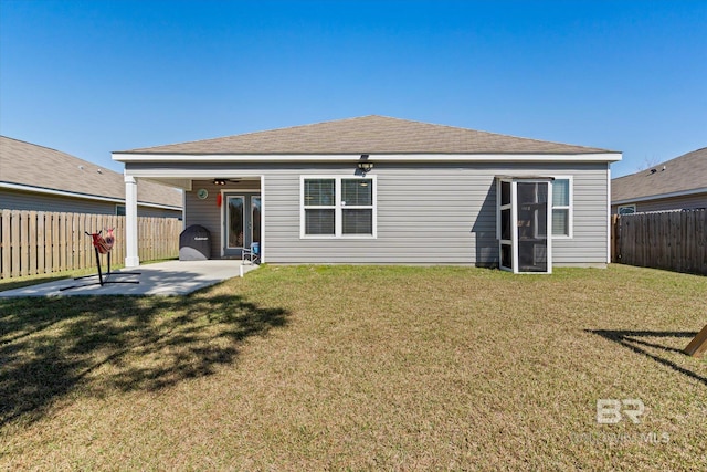 17372 Tallasee Blvd, Foley, AL 36535 - back of property featuring a patio and a fenced backyard