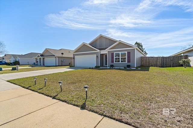 17372 Tallasee Blvd, Foley, AL 36535 - view of front of house with concrete driveway and a garage