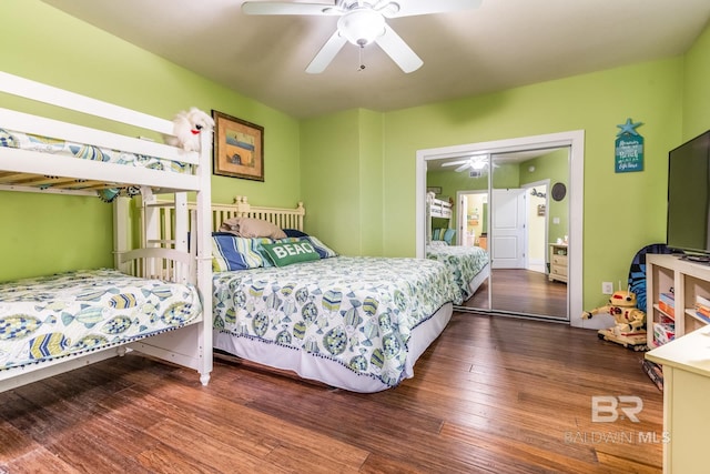 bedroom with a closet, ceiling fan, and hardwood / wood-style floors