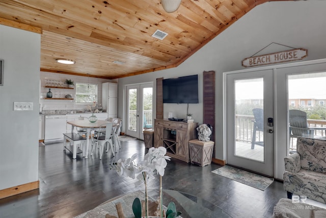 interior space featuring lofted ceiling, wood ceiling, dark wood-type flooring, and french doors