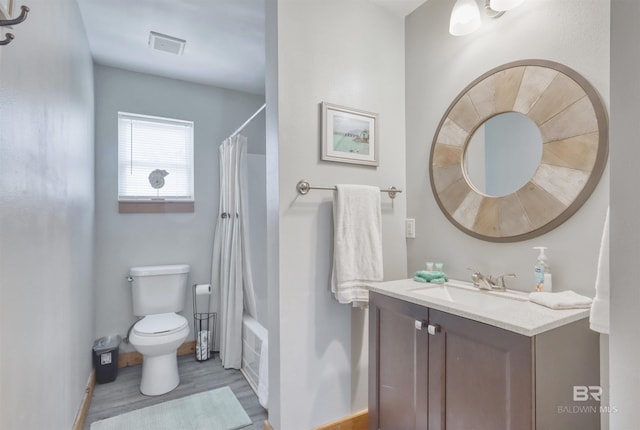 full bathroom featuring shower / bath combination with curtain, vanity, toilet, and wood-type flooring