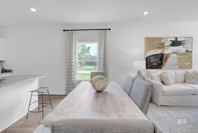 dining room featuring light hardwood / wood-style floors