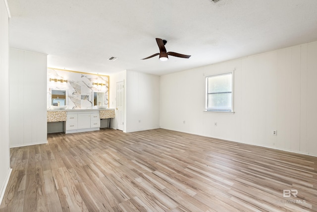 4014 Moffett Ct, Mobile, AL 36618 - unfurnished living room with light wood-type flooring and a ceiling fan