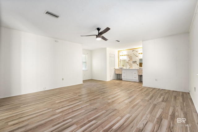 4014 Moffett Ct, Mobile, AL 36618 - unfurnished living room featuring light wood-style floors and a ceiling fan