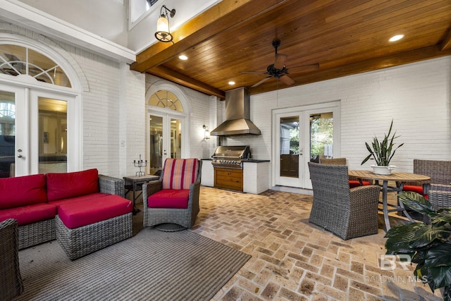 view of patio / terrace with ceiling fan, french doors, and area for grilling