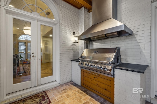 view of patio / terrace featuring french doors and area for grilling