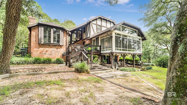 exterior space with a sunroom