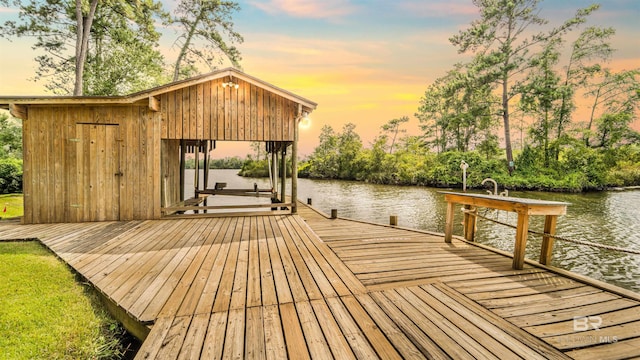 dock area featuring a water view