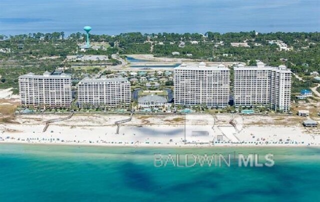 bird's eye view featuring a beach view and a water view