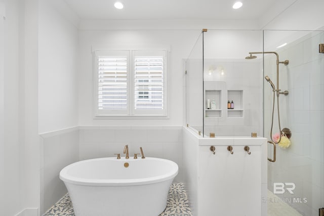 313 Cuban Lily Dr, Fairhope, AL 36532 - full bathroom featuring a shower stall, tile walls, a freestanding tub, and recessed lighting