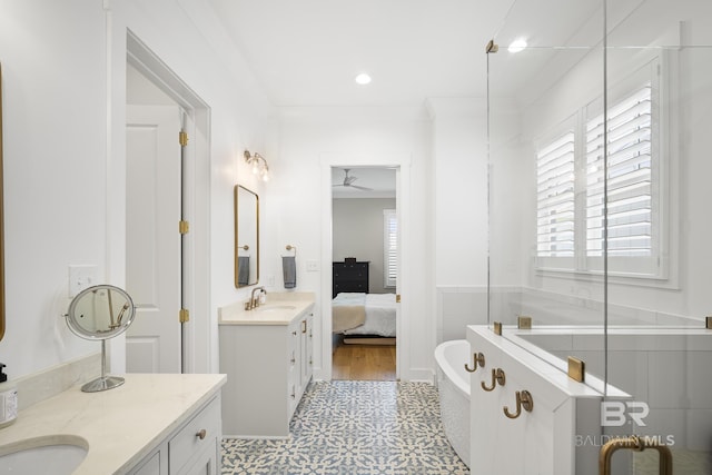 313 Cuban Lily Dr, Fairhope, AL 36532 - bathroom featuring a freestanding tub, vanity, tile patterned floors, ensuite bath, and ceiling fan