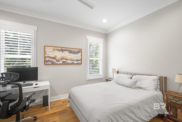 313 Cuban Lily Dr, Fairhope, AL 36532 - bedroom with wood finished floors, baseboards, a desk, crown molding, and ceiling fan