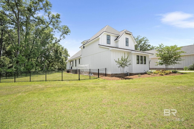 313 Cuban Lily Dr, Fairhope, AL 36532 - view of side of home featuring a shingled roof