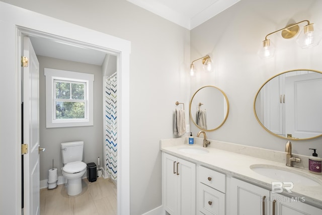 313 Cuban Lily Dr, Fairhope, AL 36532 - full bath featuring double vanity, toilet, and baseboards
