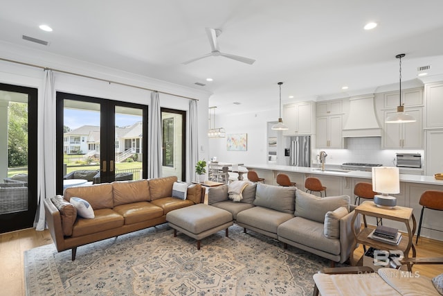 313 Cuban Lily Dr, Fairhope, AL 36532 - living area featuring light wood-type flooring, a ceiling fan, and recessed lighting
