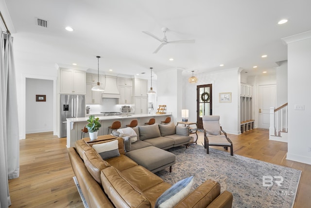 313 Cuban Lily Dr, Fairhope, AL 36532 - living area featuring ceiling fan, light wood-type flooring, recessed lighting, baseboards, and crown molding